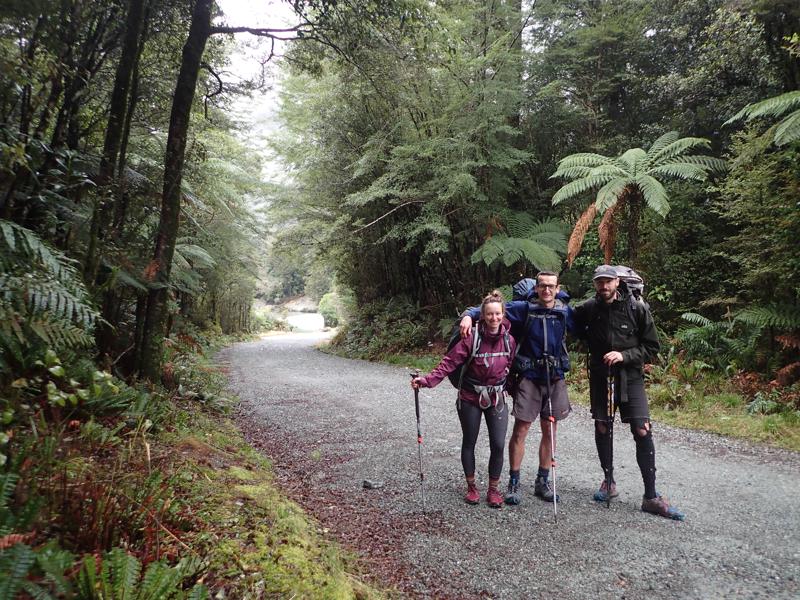 3 hikers dressed for wet weather