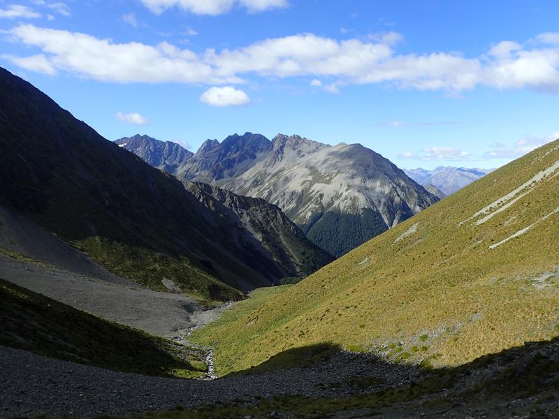 upper mountain valley with mountains beyond