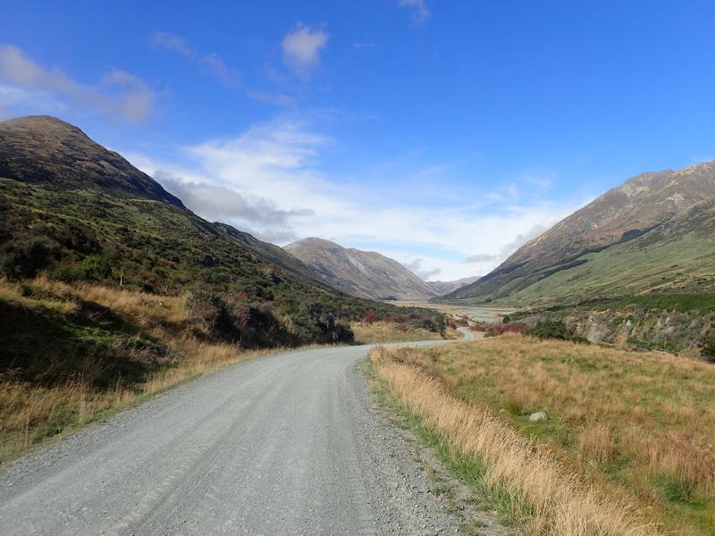 Gravel road stretching off into a valley